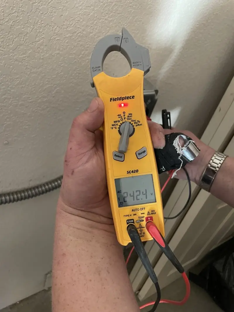 Voltage testing with clamp meter during Aluminum Wiring Replacement in Huron